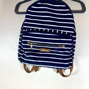 Madden Girl Backpack White and Navy Blue with adjustable straps and gold zippers